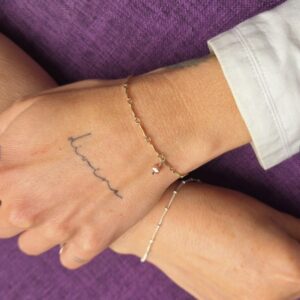 bracelet permanent en argent et gold filled avec une breloque perle de culture